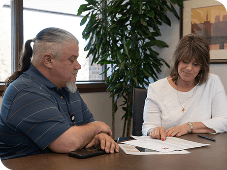 Two people having a meeting about joining the team